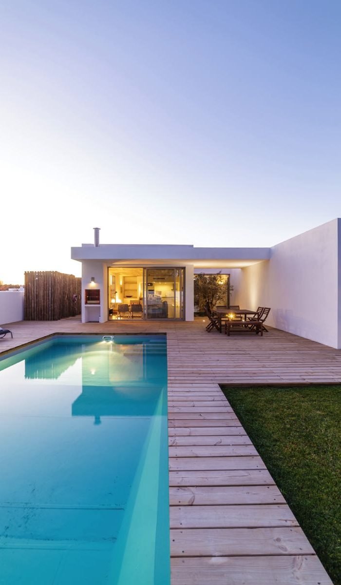 modern-house-with-garden-swimming-pool-and-wooden-P7NVS7C.jpg